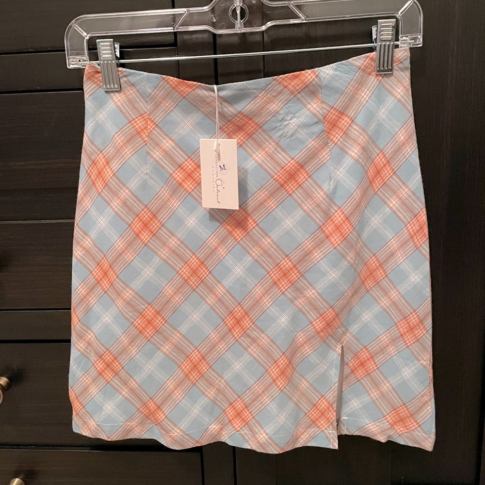 Generation Outcast Clothing plaid mini skirt with small slit.